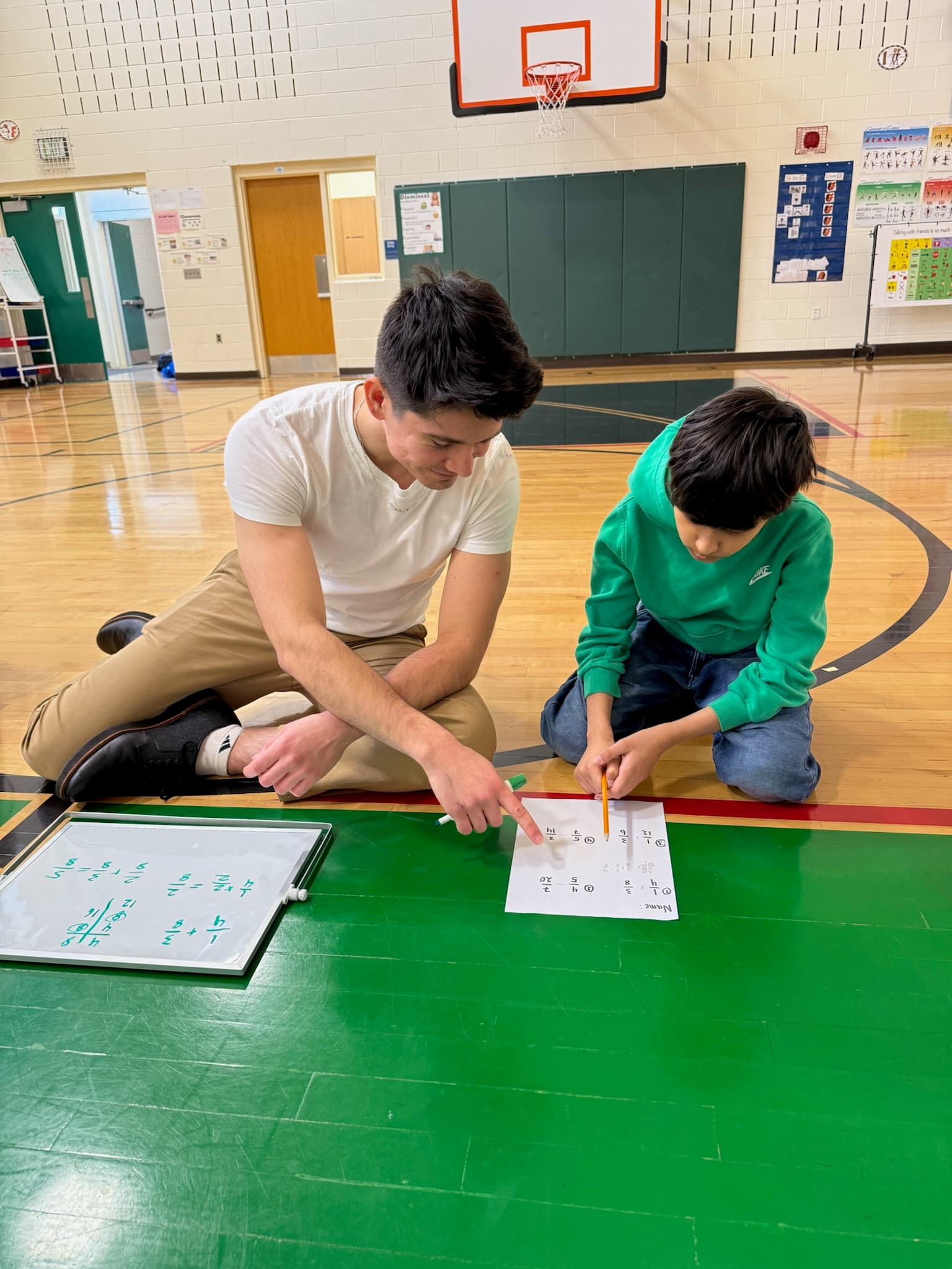TCP mentors supporting students in classroom